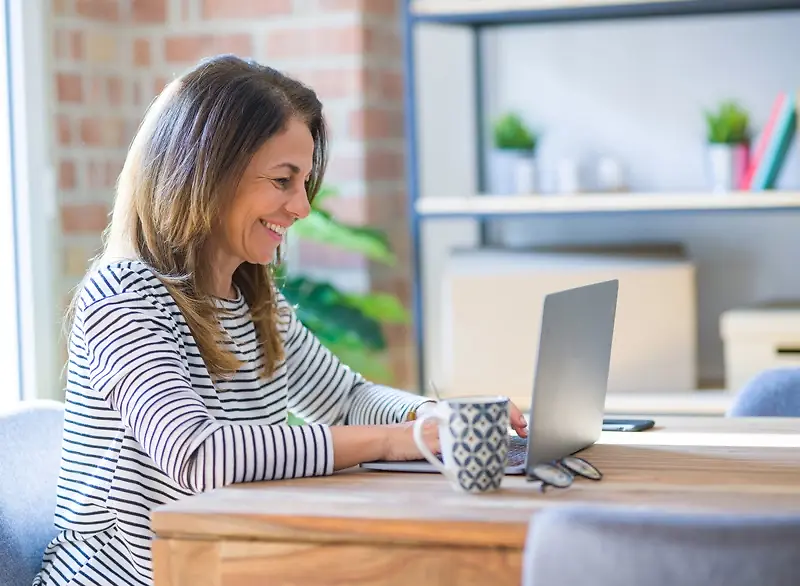 woman reading laptop